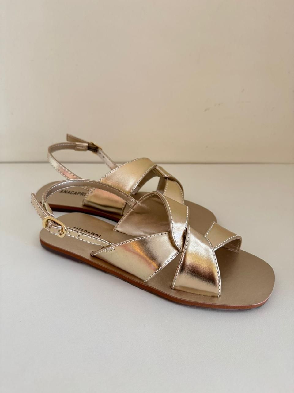 RASTEIRA ENTRELAÇADA PESPONTOS DOURADA